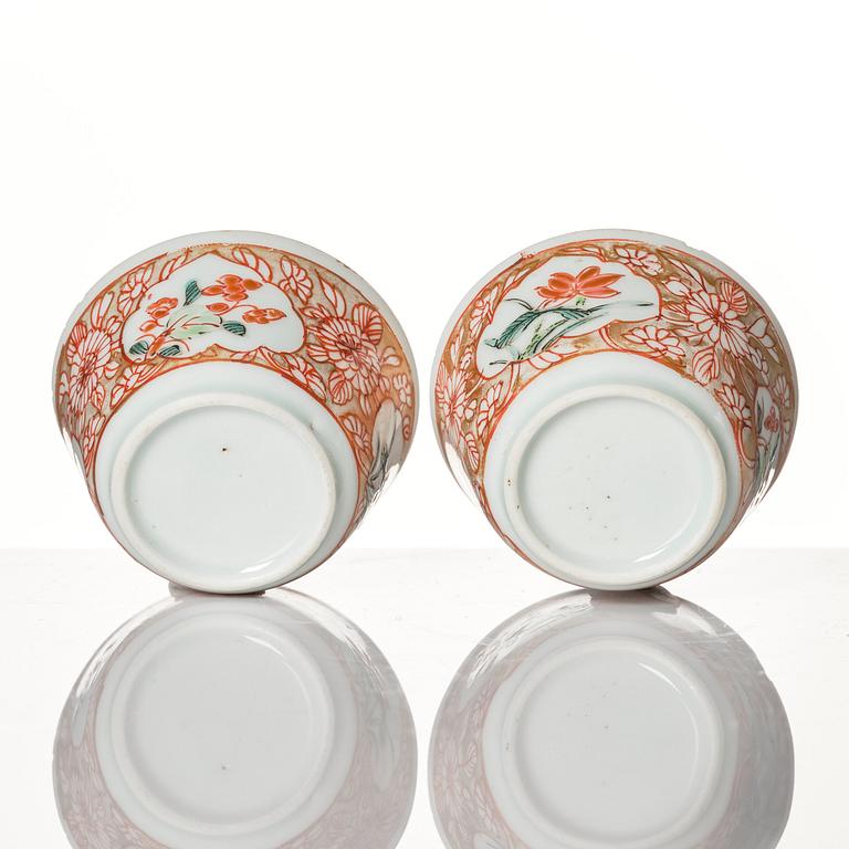 A pair of famille rose miniature cups with stands, Qing dynasty, 18th Century.
