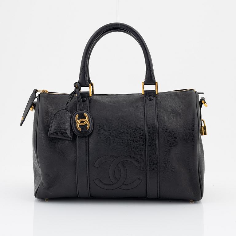 Chanel, a black caviar leather 'Boston bag'.