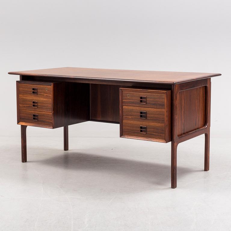 A 1960´s  Danish writing desk veneered with jakaranda, possibly designed by Arne Vodder.