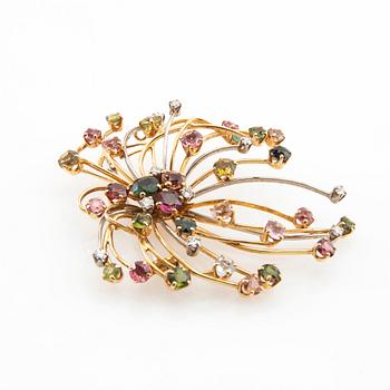 CF Carlman, Brooch 18K gold set with round brilliant-cut diamonds and faceted gemstones, Stockholm 1955.