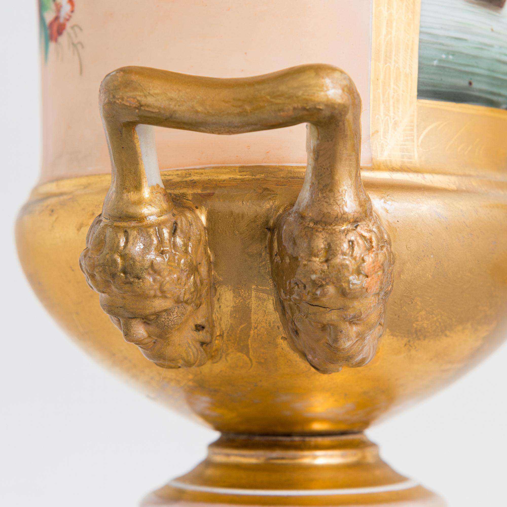 A pair of German porcelain urns from around the mid-19th century.