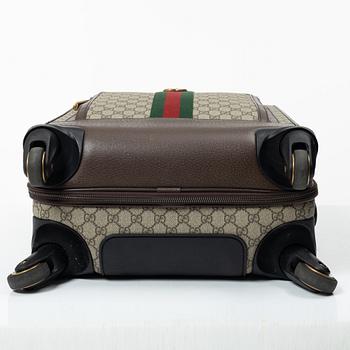 Gucci, suitcase / cabin bag.