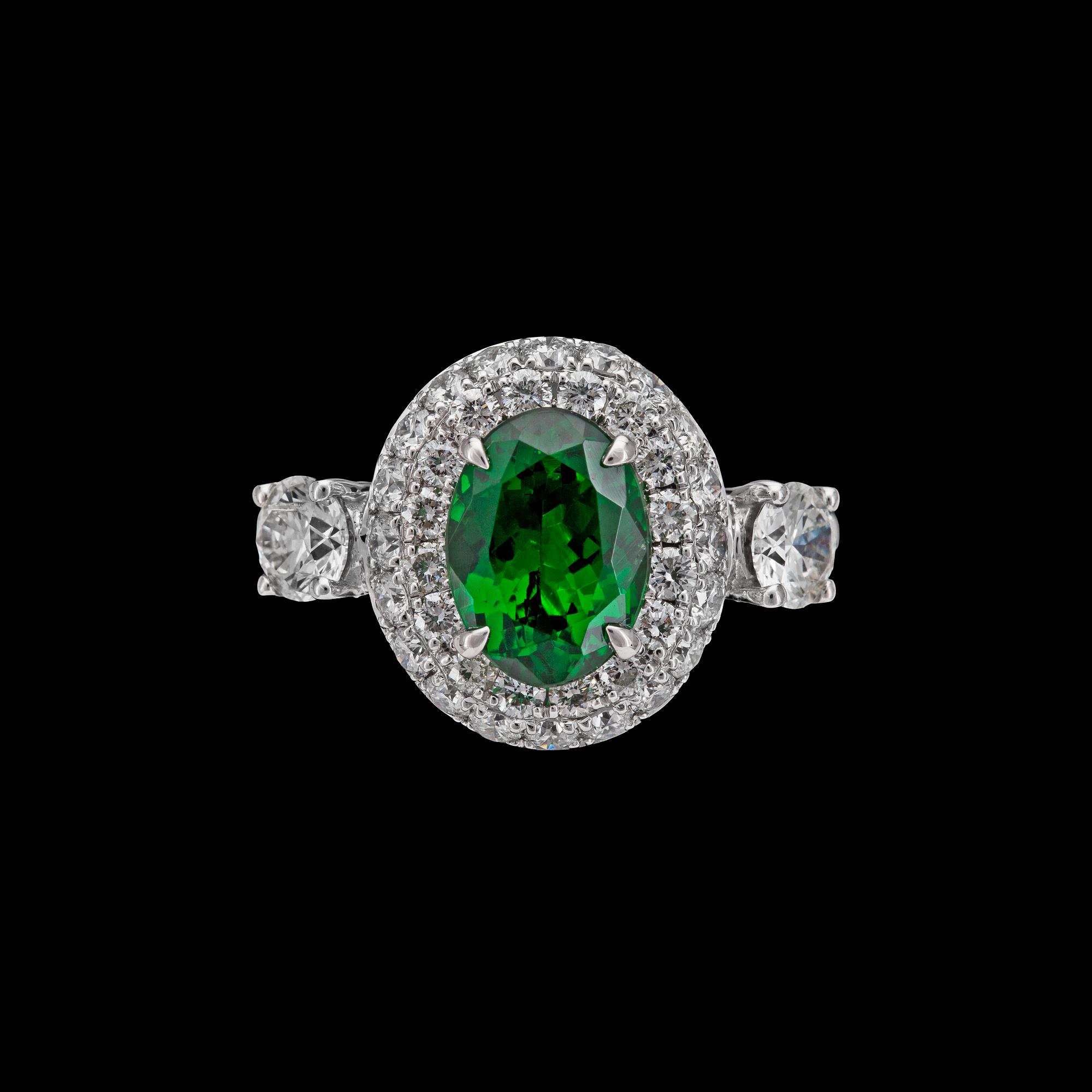 A tsavorite,2.05 cts, and brilliant cut diamond ring, tot. 1.23 cts.