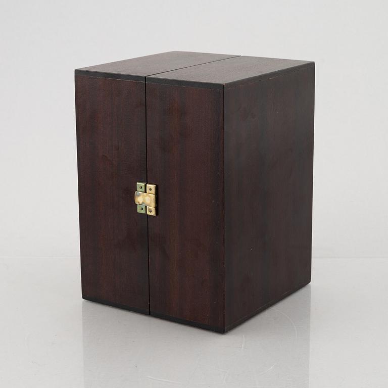 Pierre Forssell, eight gilded cups and a bottle, in a box, Skultuna, Sweden.