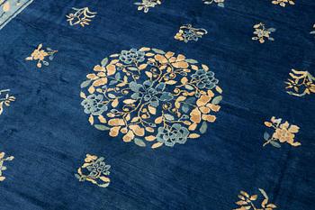 An antique Peking (Beijing) carpet, North China, c. 340 x 275 cm.