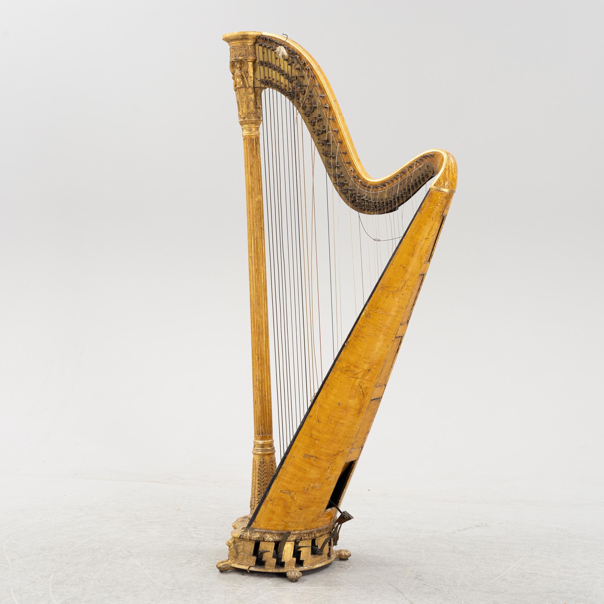 A pedal harp by Jacob & James Erat, London, No 1610, probably made between 1825-1830.