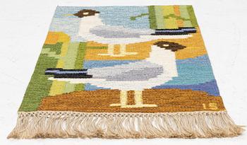 Ingegerd Silow, a flat weave carpet/ wall decoration, "Skrattmås", Axeco, Sweden, signed IS, c. 86 x 57 cm.