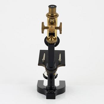 A microscope with accessories, Bausch & Lomb Optical Co. Rochester N.Y, early 20th Century.