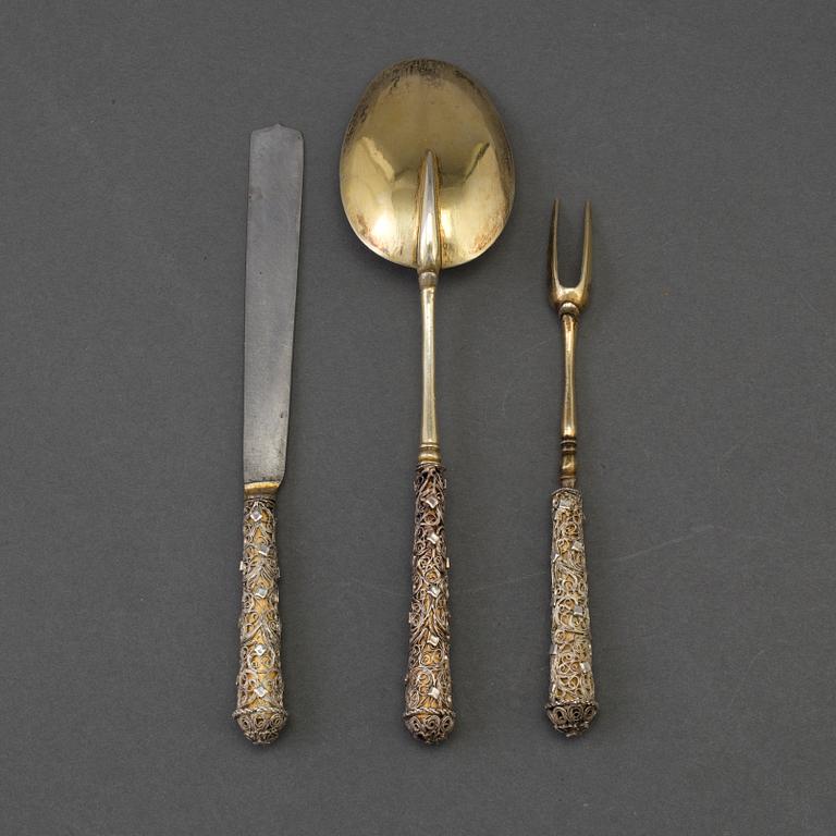 A German 17th century silver-gilt and filigree three-piece travel cutlery, unmarked.