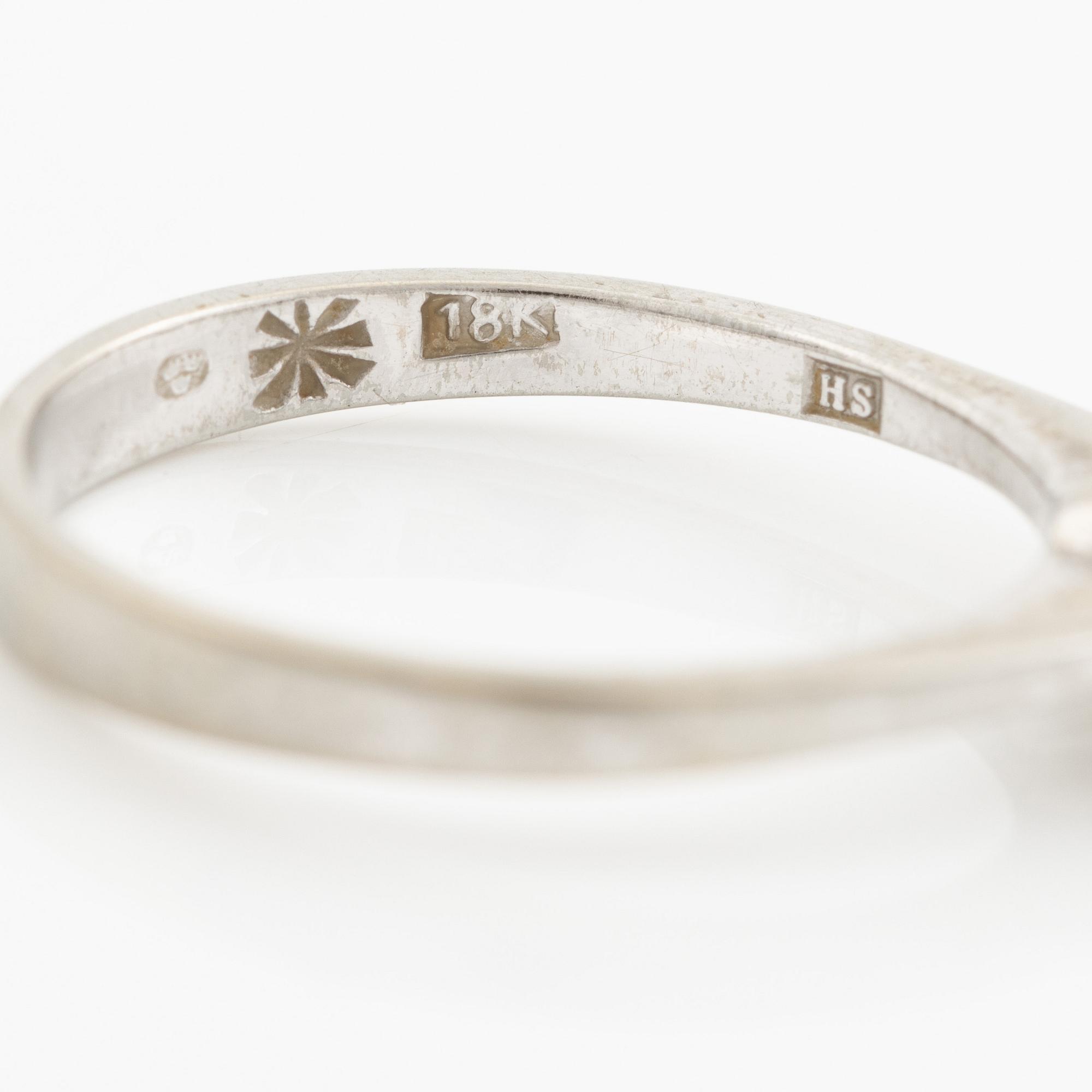 Ring, 18K vitguld med briljantslipad diamant.