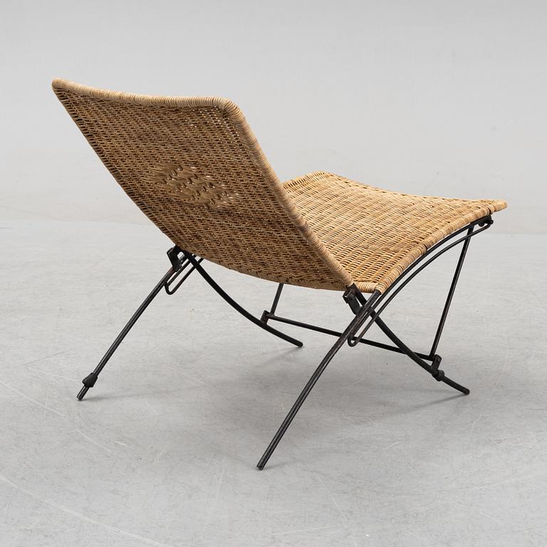 A rattan easy chair, 1960s.