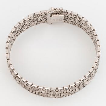 18K white gold bracelet, Uno A Erre, Italy.