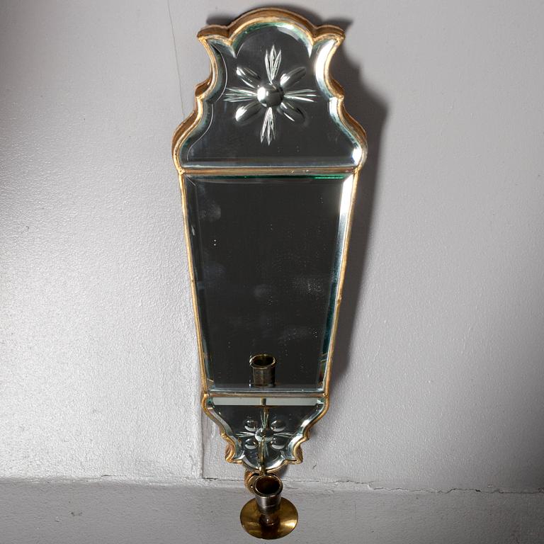 SPEGELLAMPETT, 1900-talets första hälft.