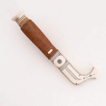 A reindeer horn knife by Johan Tuuri, signed and dated 1981.