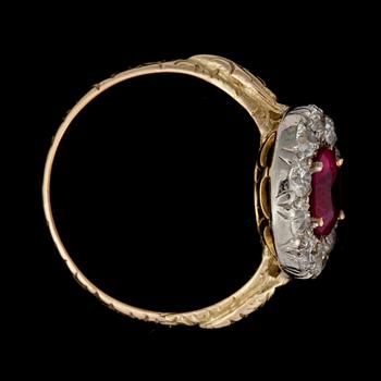 A untreated Burmese ruby, 1.03 ct and diamonds, total carat weight circa, 0.80 ct, ring.