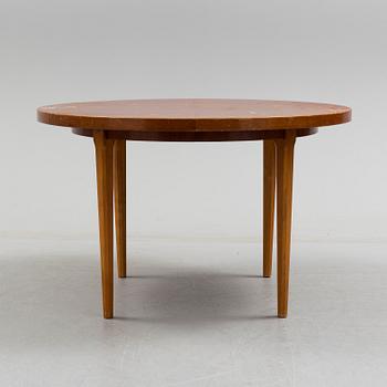 A 1940s mahogany veneer table.