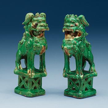 1592. A set of two green glazed buddhistic lions, Qing dynasty.