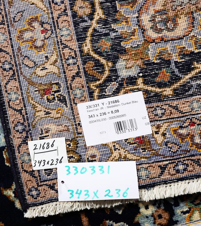 A Kashan carpet, c. 343 x 236 cm.