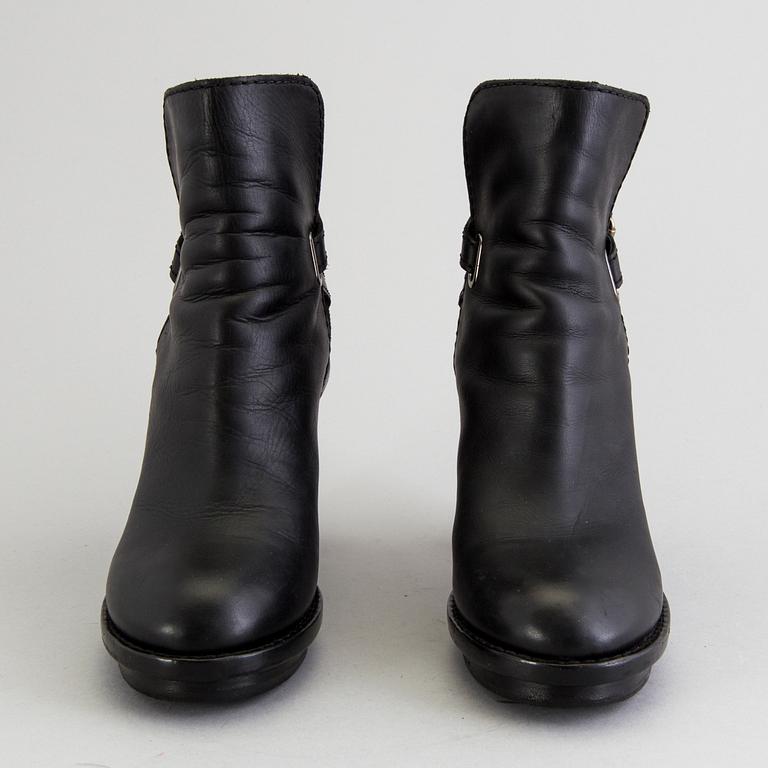A pair of Acne boots, size 40.