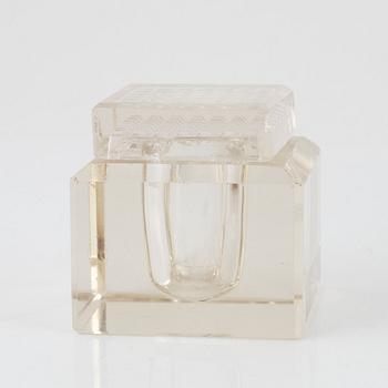 A gilt inkwell and candle holder, around 1900.