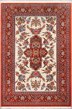 A Ghom rug, ca 155 x 105 cm.