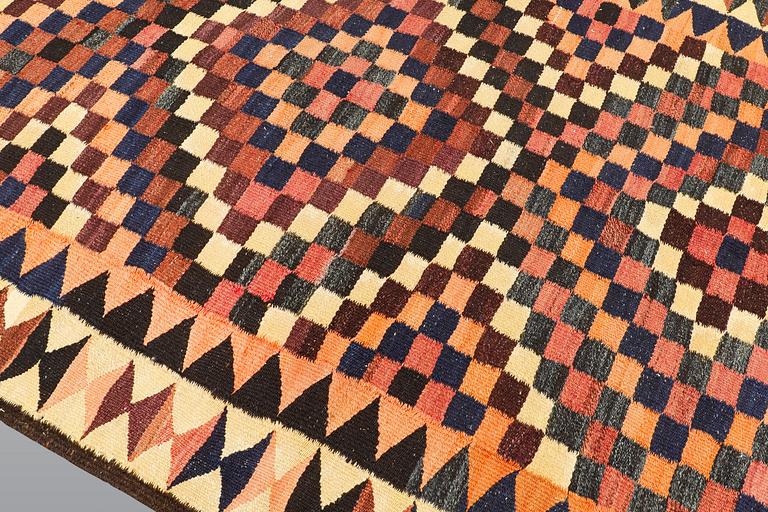 A kilim carpet, ca 333 x 163 cm.