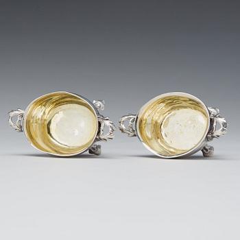 A mached pair of Swedish Rococo parcel-gilt silver salt-cellars, mark of Johan Bergengren, Kristianstad 1777 and 1780.