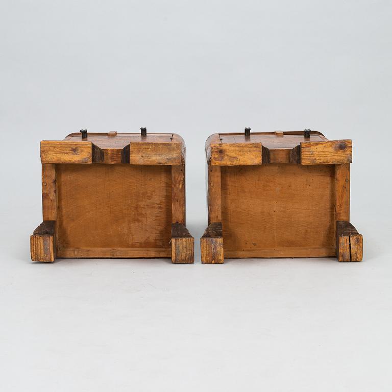 A pair of around 1930s bedside tables.