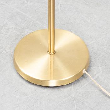 A brass floor light by Asea, seconf half of the 20th Century.