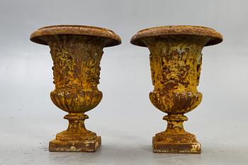 A pair of cast iron garden urns fist half of the 20th century.