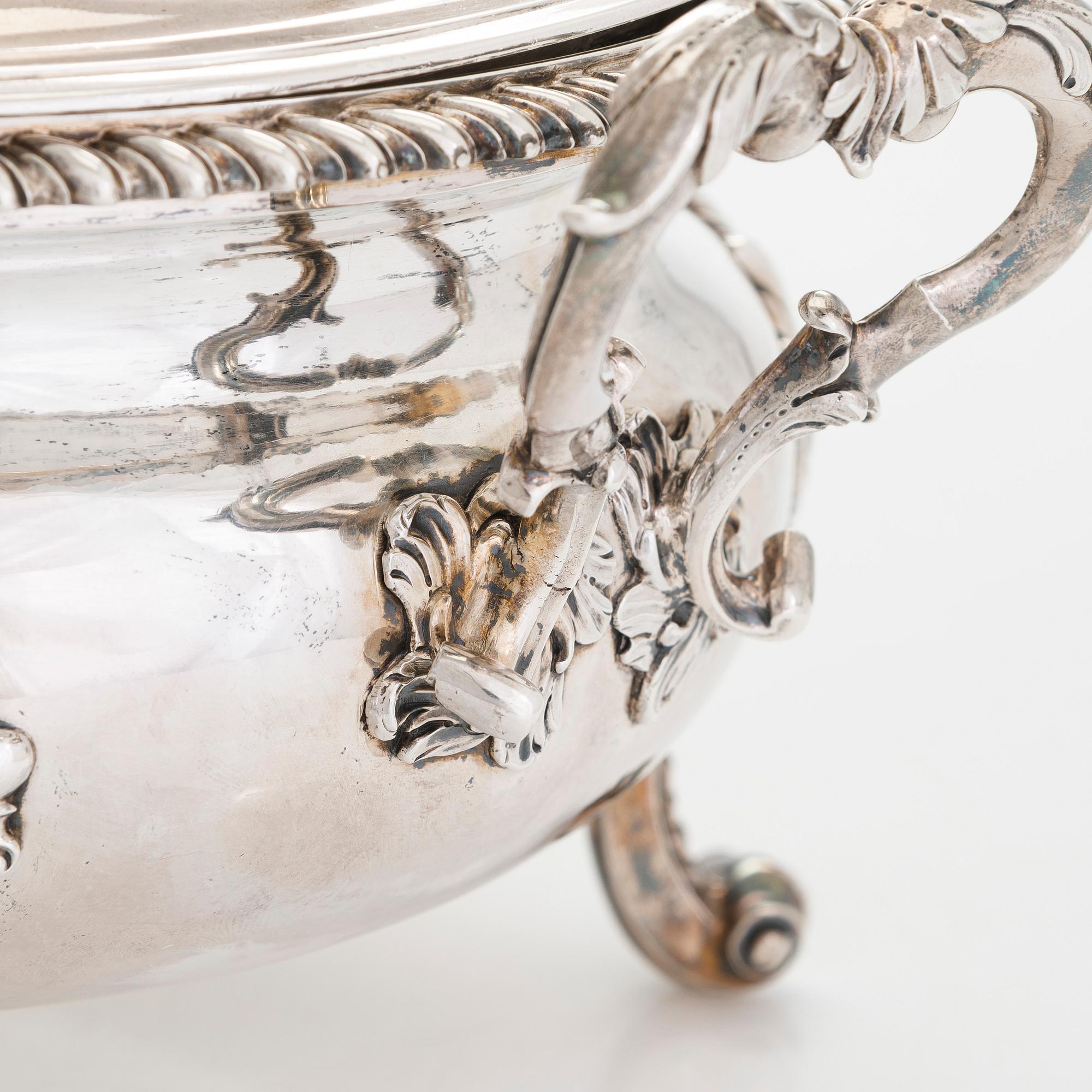 A mid-18th-century sterling silver tureen, mark of Peter Archambo II and Peter Meure, London 1753.