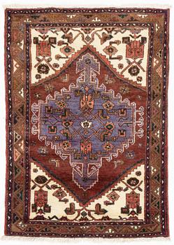 A Carpet, West Persian, circa 145 x 103 cm.