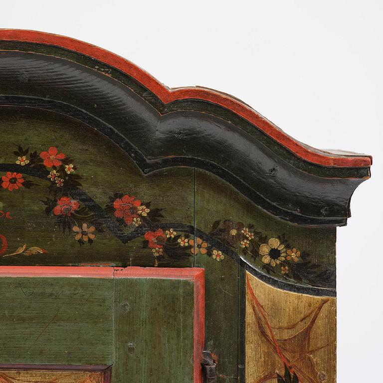 Hängskåp, allmoge, av Jöns Månsson, Forsa, Hälsingland, märkt JSS 1792.