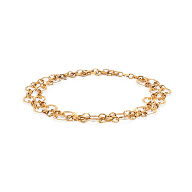 YVES SAINT LAURENT, a gold colored metal chain.