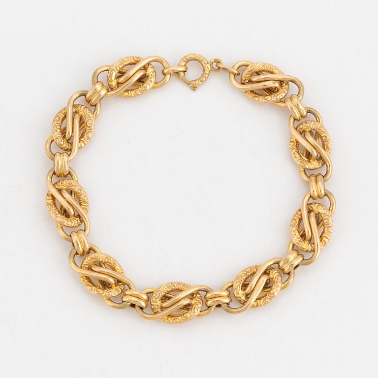 A fancy-link bracelet.