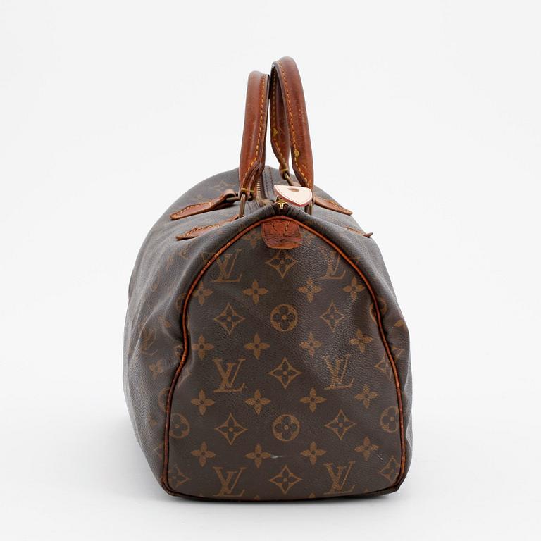 LOUIS VUITTON, a monogram canvas bag, "Speedy 30".