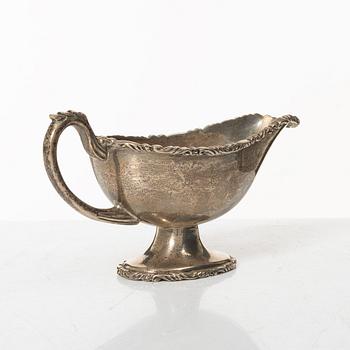 A silver sauceboat with tray and spoon, Anaya, Mexico, second half of the 20th Century.