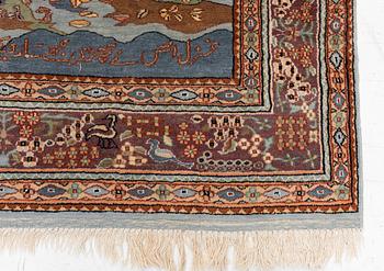 An oriental figural rug, c. 182 x 128 cm.