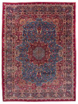 406. A Mashad carpet, signed Saber, c. 468 x 348 cm.