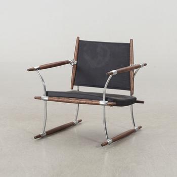 JENS QUISTGAARD, a Stokke armchair.