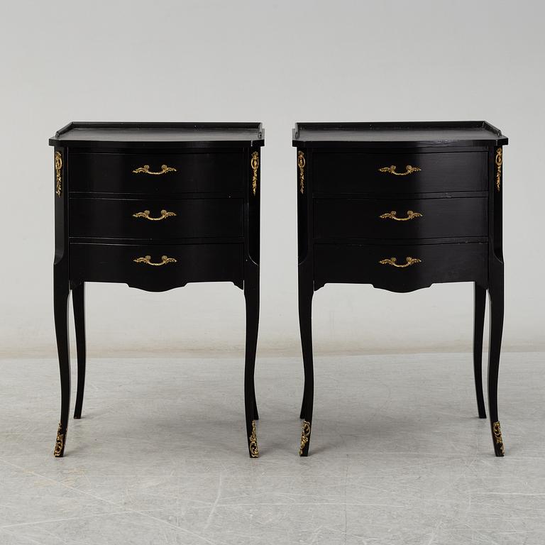 A second half of the 20th Century rococo style pair of bedside drawers.