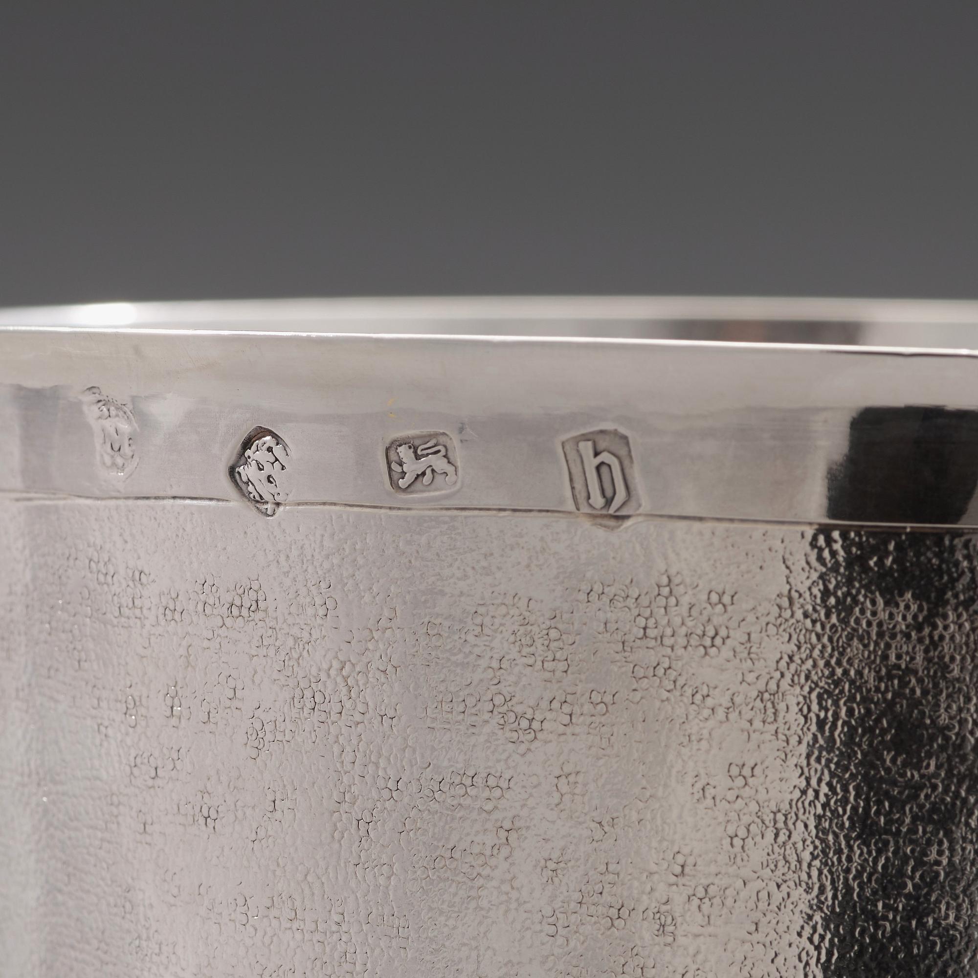 An English 17th century silver cup and cover, makers mark IM, London 1685.