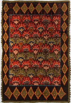 A Finnish folkart blanket / long pile ryijy-rug, presumably from the turn of the century 1900. Ca 208 x 136 cm.