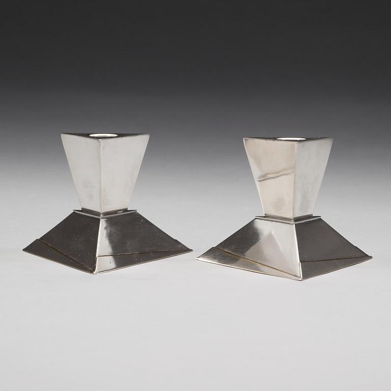 Elsa Tennhardt, A pair of Elsa Tennhardt silver plated candlesticks, E & J Bass Company, New York ca 1928.