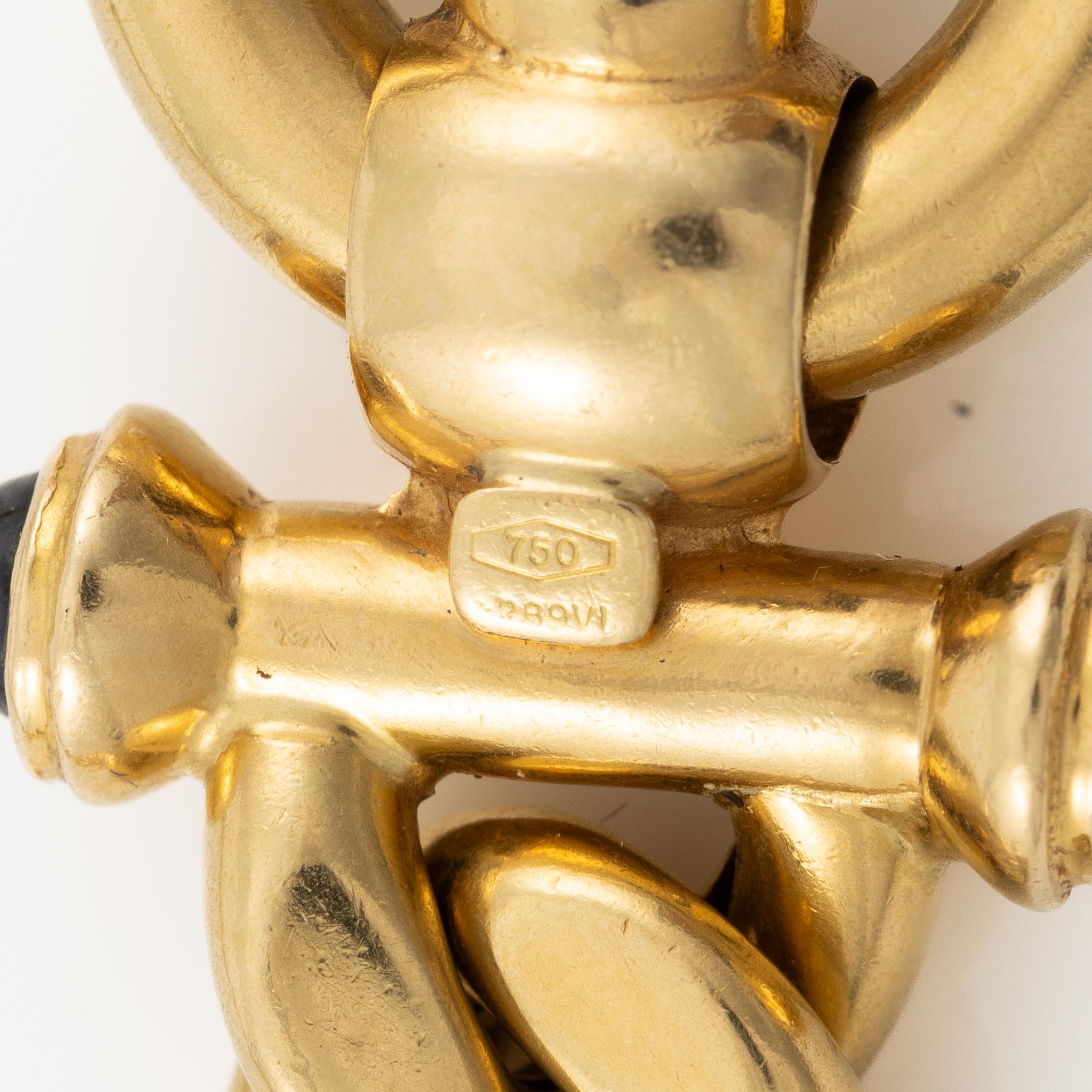 Necklace 18K gold with cabochon-cut sapphires.