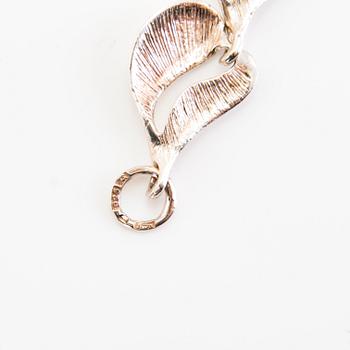 A set of sterling silver necklace and bracelet. Valo-koru, Turku.