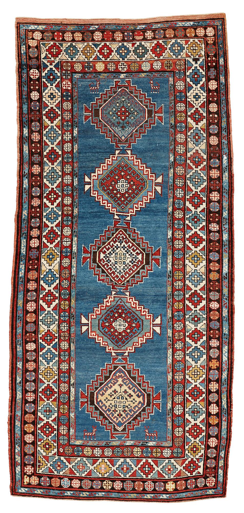 A RUNNER, a semi-antique Caucasian, ca 303,5 x 129,5-140,5 cm (as well as one end with 2,5 cm flat weave).