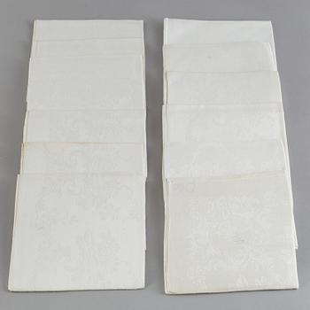 Seven table cloths and 26 napkins, mostly linen, first half of the 20th Century.