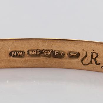 Eero Rislakki, armband, 14K guld och tigeröga, Westerback Helsingfors 1957.