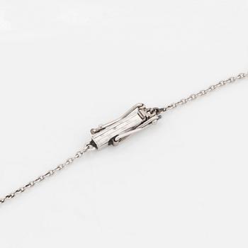 A platinum necklace set with old- and rose-cut diamonds.